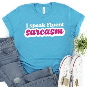 Light blue t-shirt that reads: I speak fluent sarcasm