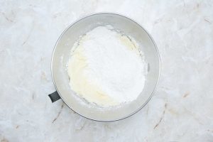 dough ingredients in a stand mixer bowl