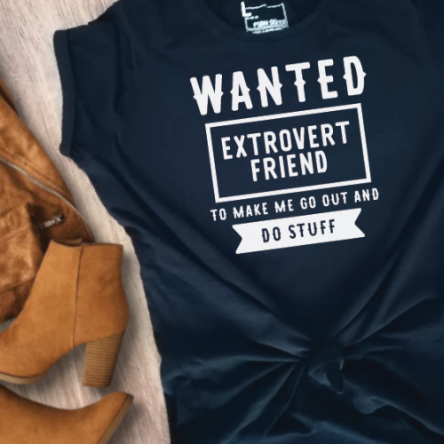 Navy blue shirt that reads: Wanted Extrovert friends who will make me go out and do stuff.
