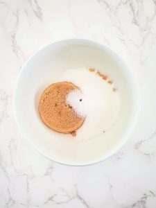 bowl containing brown and white sugar