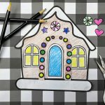 colored build your own gingerbread house printable on a buffalo check background