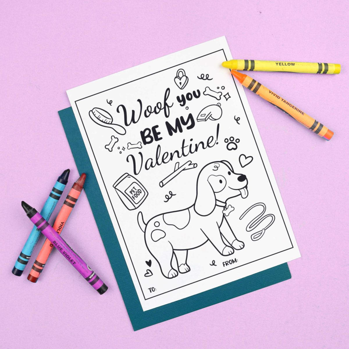 Kitten coloring page valentine card with a blue envelope near crayons