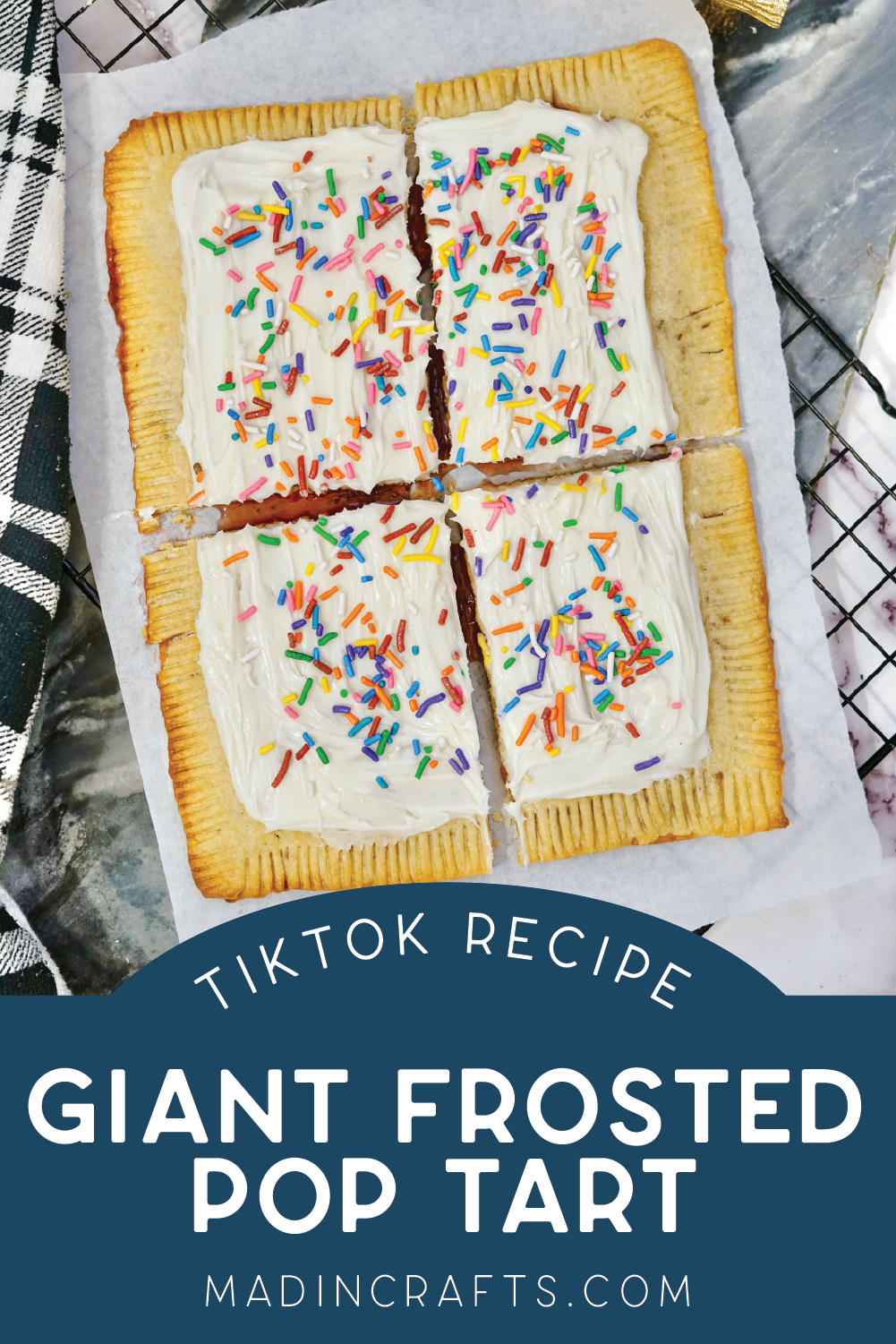 baked and frosted giant pop tart cut into fours