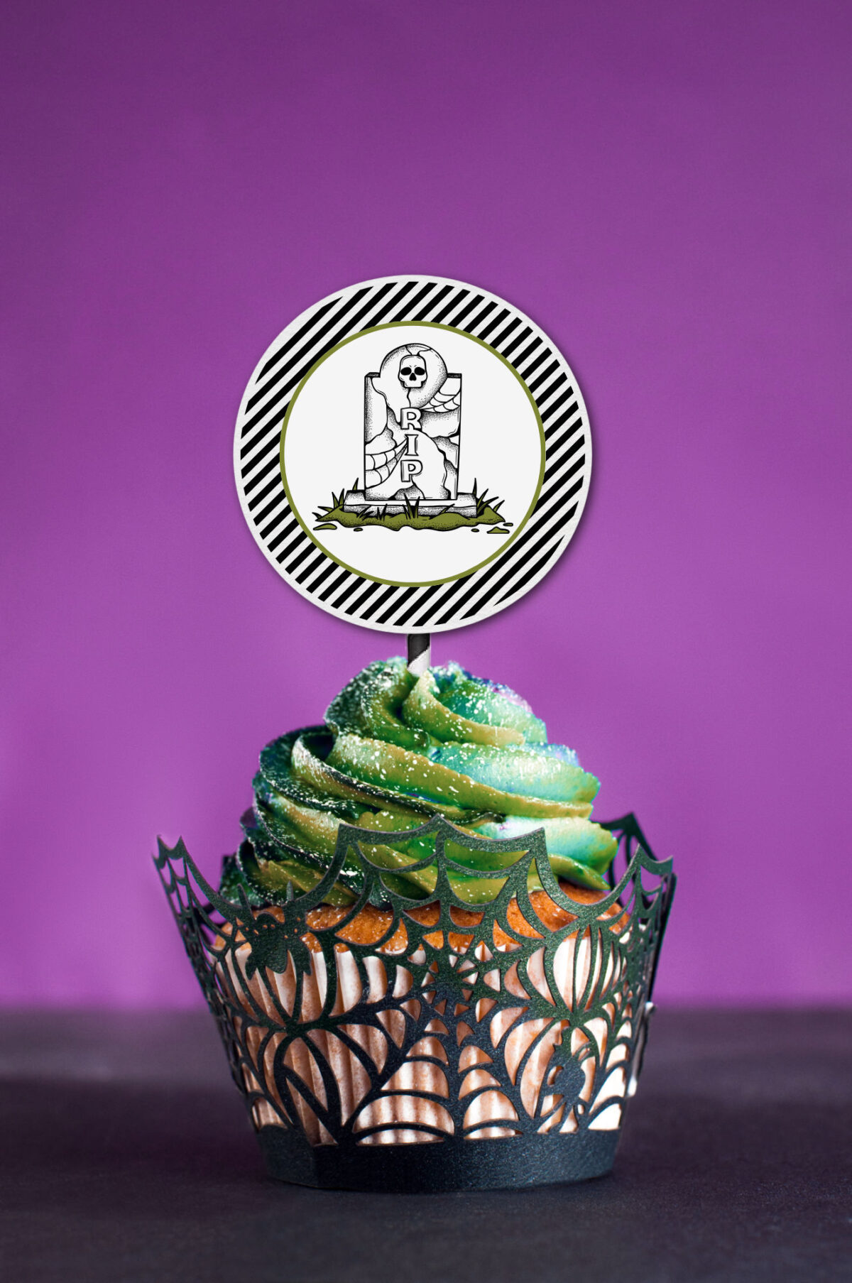 Beetlejuice cupcake topper on a halloween cupcake