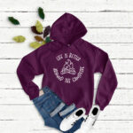 Life is Better Around the Campfire SVG on a burgundy sweatshirt