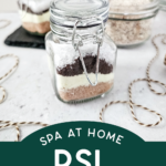 several glass containers of pumpkin spice latte bath soak