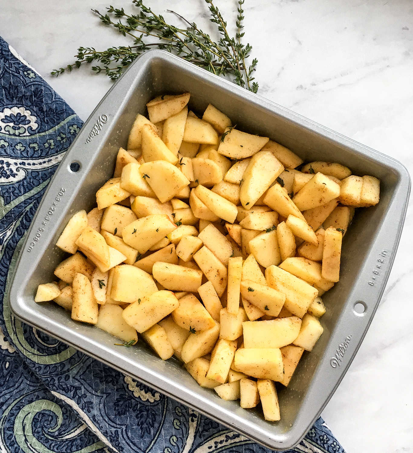 a baking dish of chopped apples