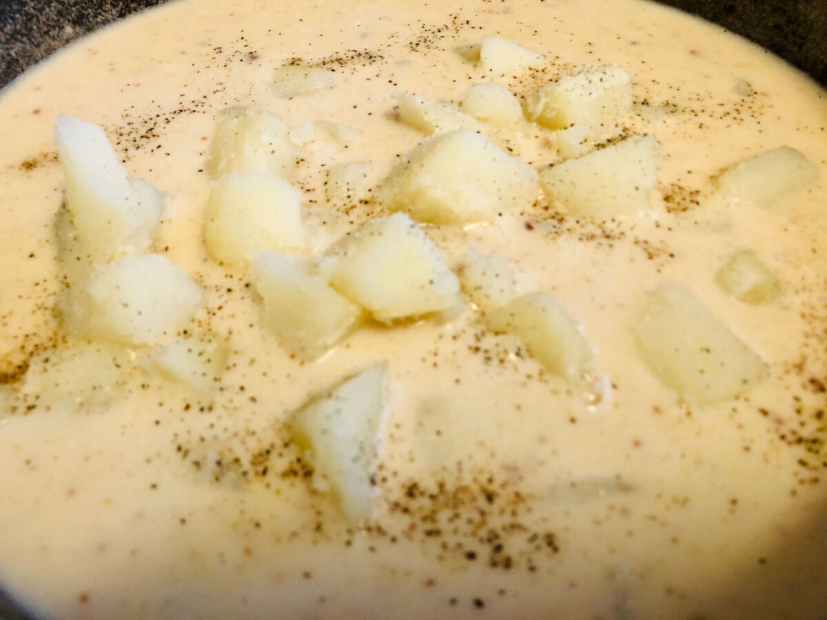 potatoes and seasonings in soup