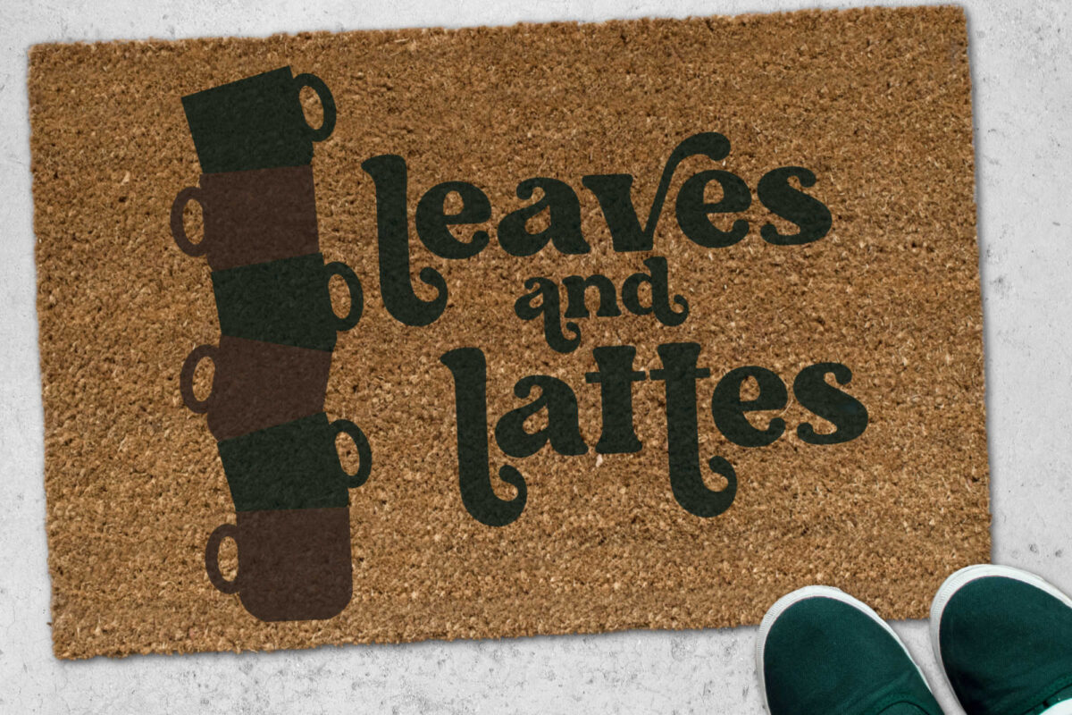 coir doormat with leaves and lattes design