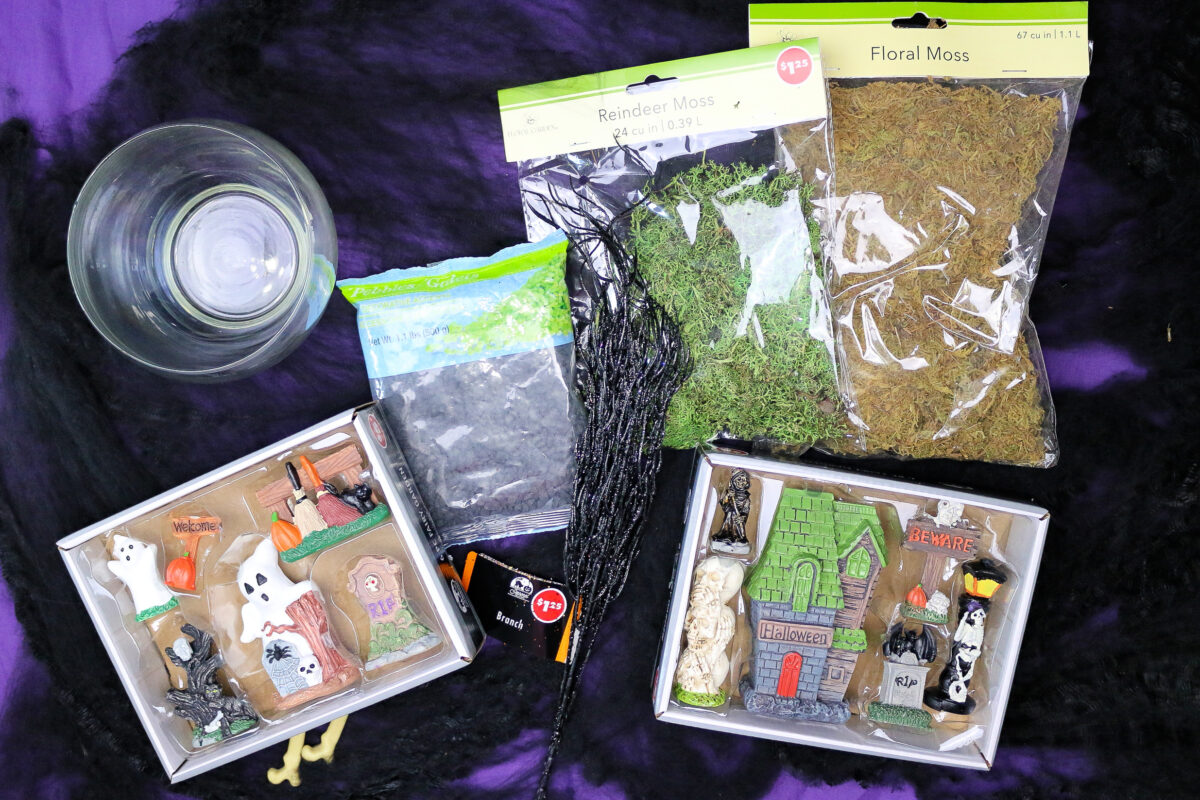 flat lay of dollar store supplies for a cemetery fairy garden