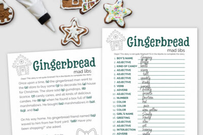 Printed mad lib sheets near gingerbread cookies