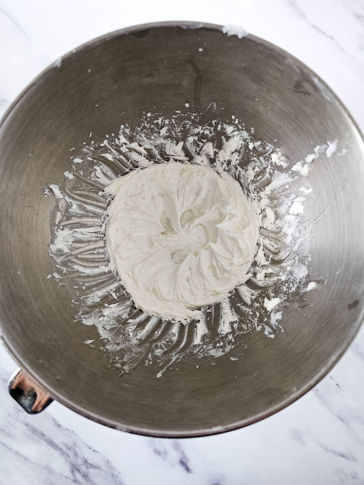 mixing bowl filled with whipped body butter