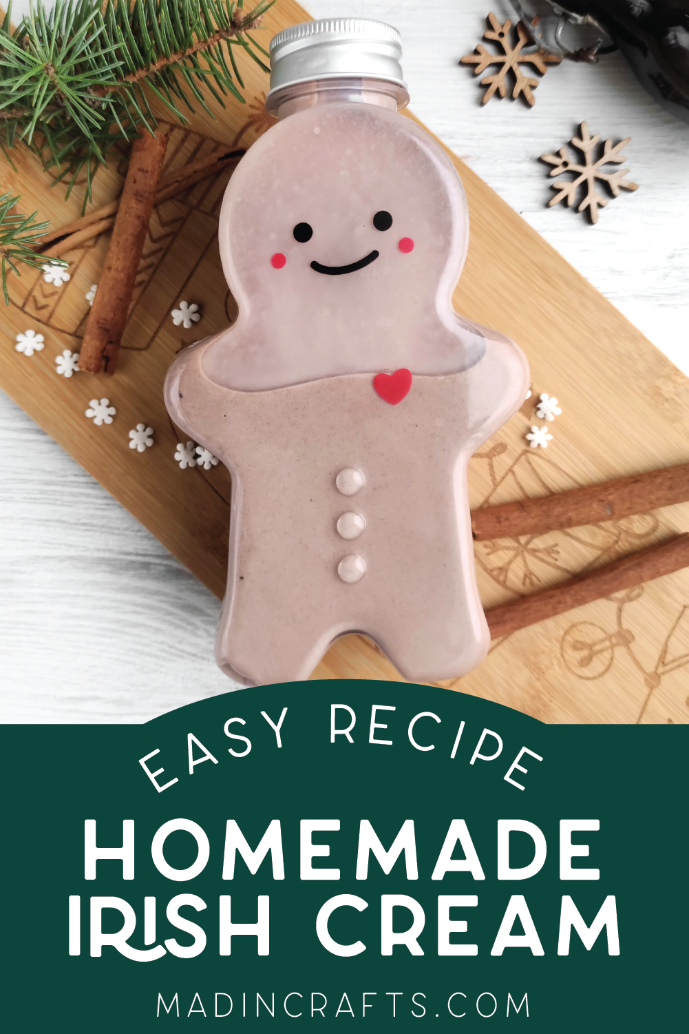 gingerbread man shaped bottle of homemade irish cream near Christmas decor