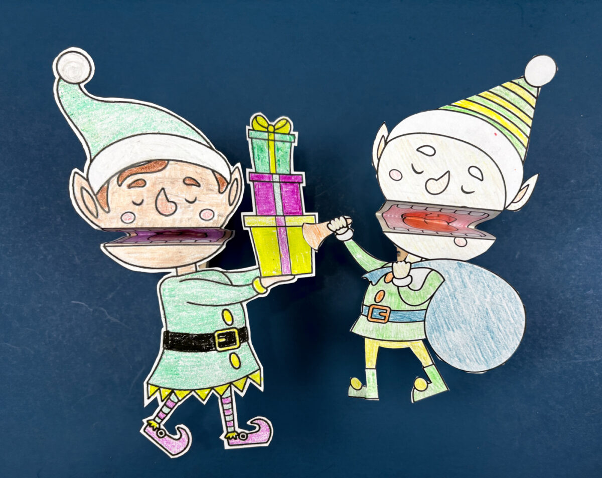 two clothespin elf puppets on a blue background