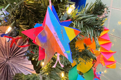 colorful painted christmas ornament on a tree